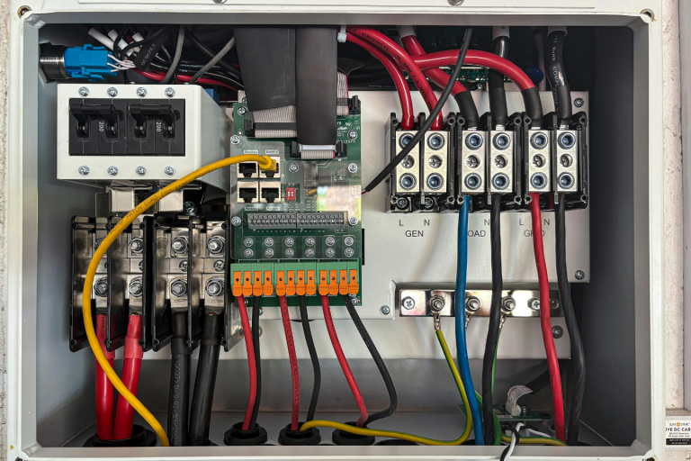 Electrician replacing an outdated electrical panel in Somerville, MA