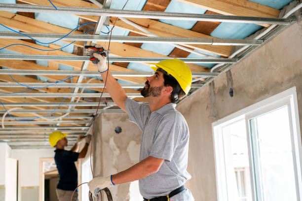 Experienced electrical contractor completing wiring installation for business property